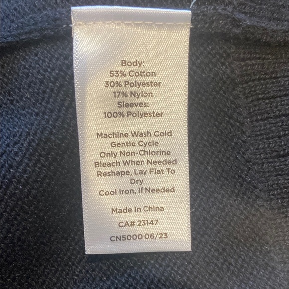 Chic Black Sweater with Sheer Polka Dot Sleeves - Picture 5 of 7